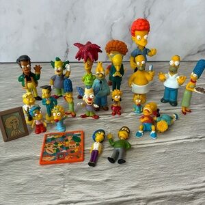 Assorted Vintage Simpson Figurines Lot of 22